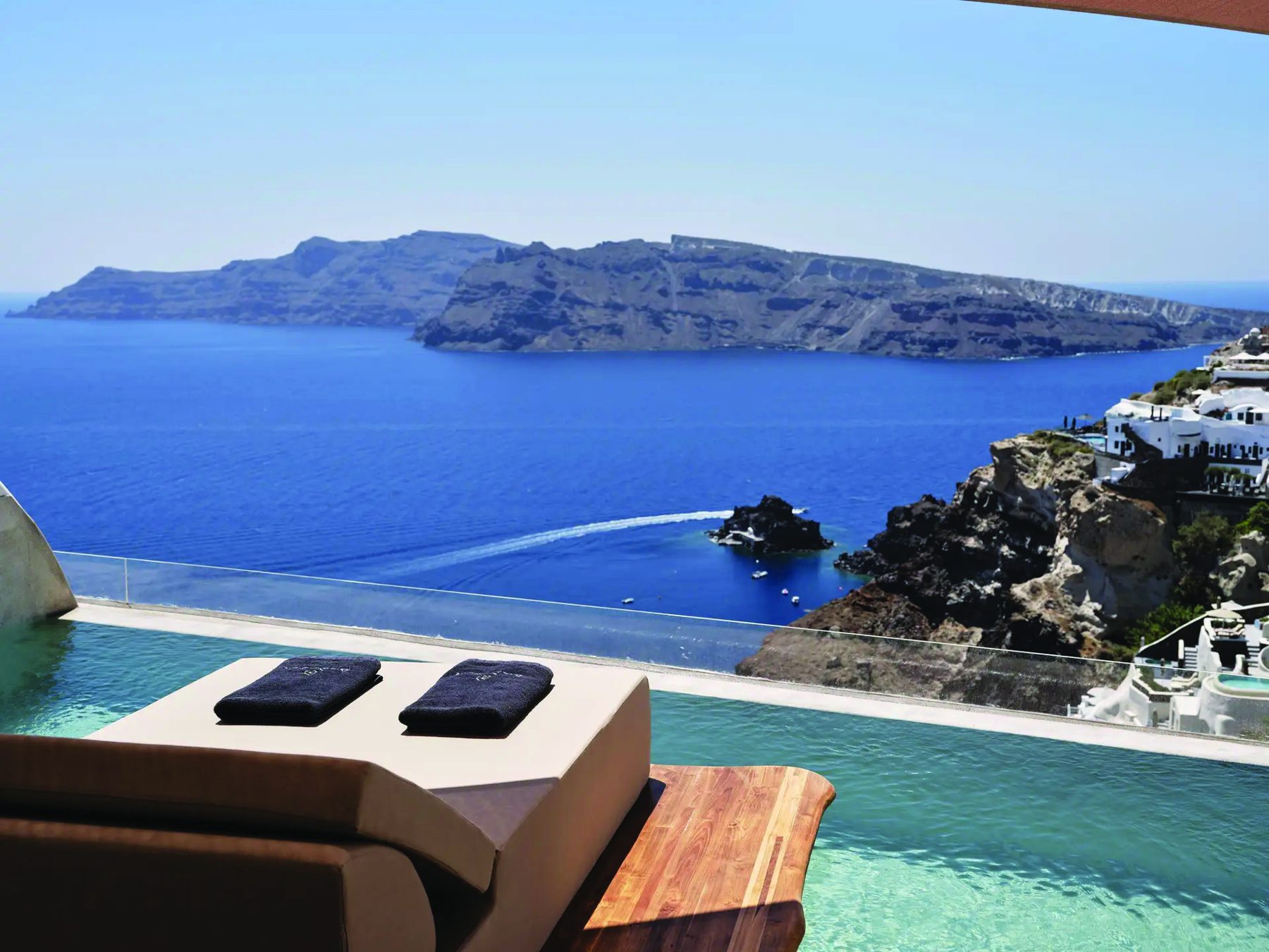 An infinity pool overlooking the caldera at Sunset Villa Aristotelis, Andronis Luxury Suites, Oia