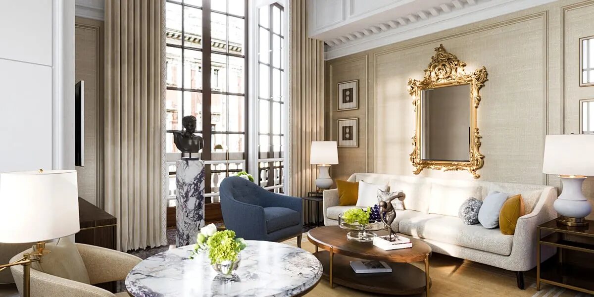 A Corinthia Rome suite with double-height windows, a gilded mirror over the sofa and a marble table