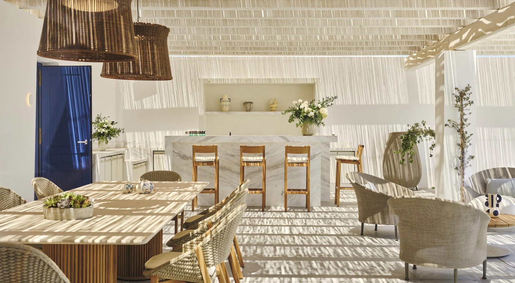 The outdoor living room and bar at the Syros Villa, Four Seasons Hotel Mykonos