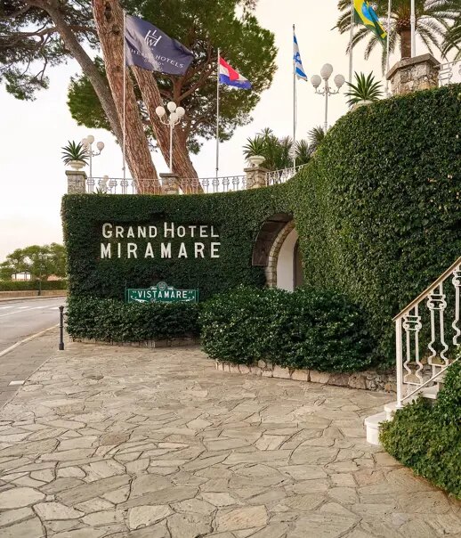 The ivy-covered entrance wall of Grand Hotel Miramare on the Santa Margherita seafront